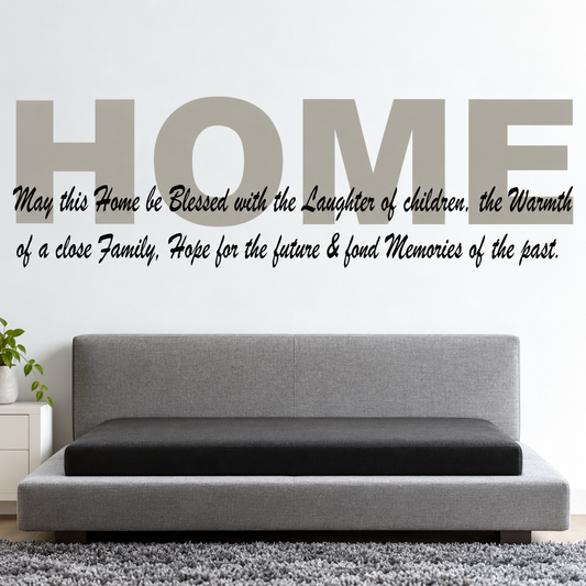 Gray HOME and black family blessing quote wall decal above gray sofa