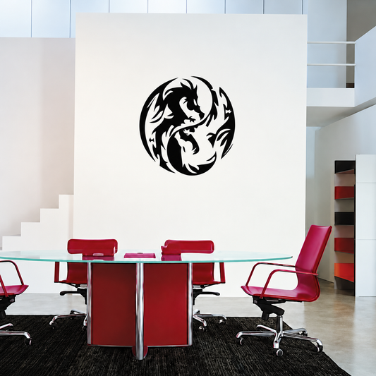 Black circular dragon emblem above a glass table in the existing office setting