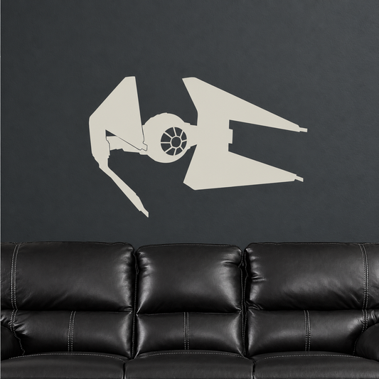 Cream space fighter decal above black leather sofa, enhanced original secondary photo