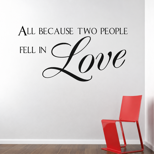all because two people fell in love wall quote decal displayed on a wall