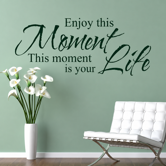 Enjoy this moment wall quote on a green wall
