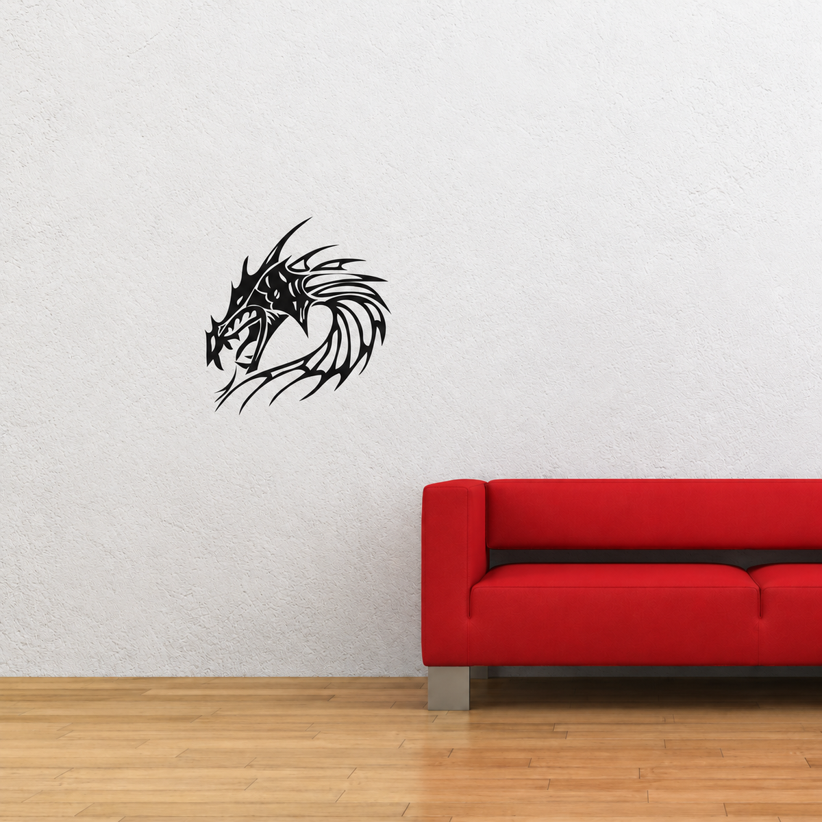 Black dragon head at realistic scale on a pale wall beside a red sofa
