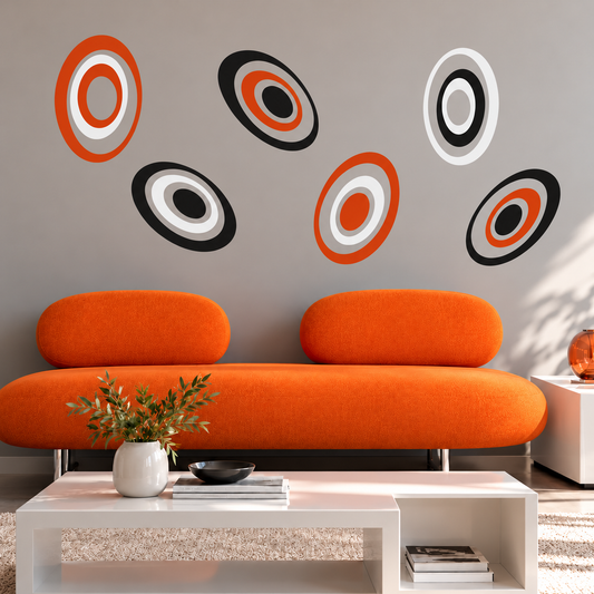 Oval wall decal set at balanced scale in a close contemporary room view