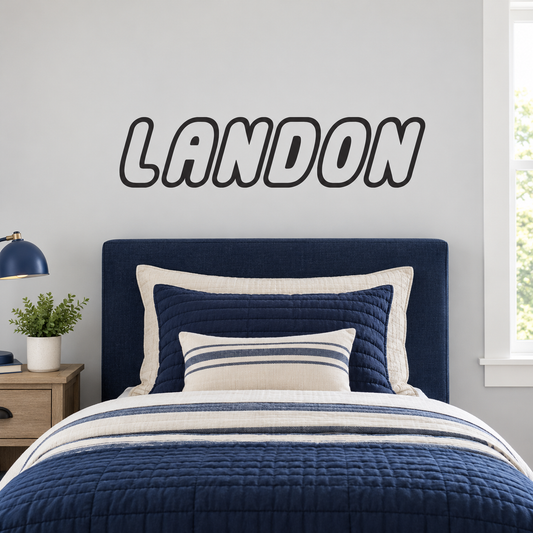 Personalized LANDON block letter wall decal, 36 inch width, above a twin bed