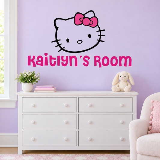 Personalized bow cat outline and pink Kaitlyn's Room lettering on a lavender wall above a white dresser