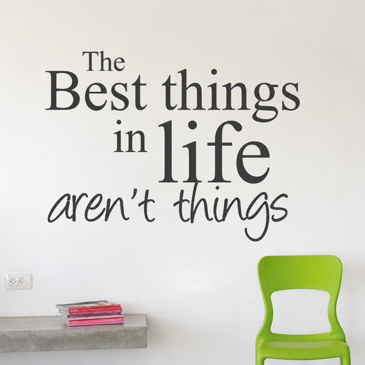 the best things in life aren t things wall quote decal displayed on a wall