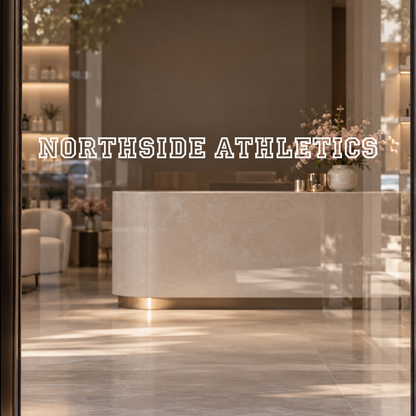 NORTHSIDE ATHLETICS custom lettering on glass close up
