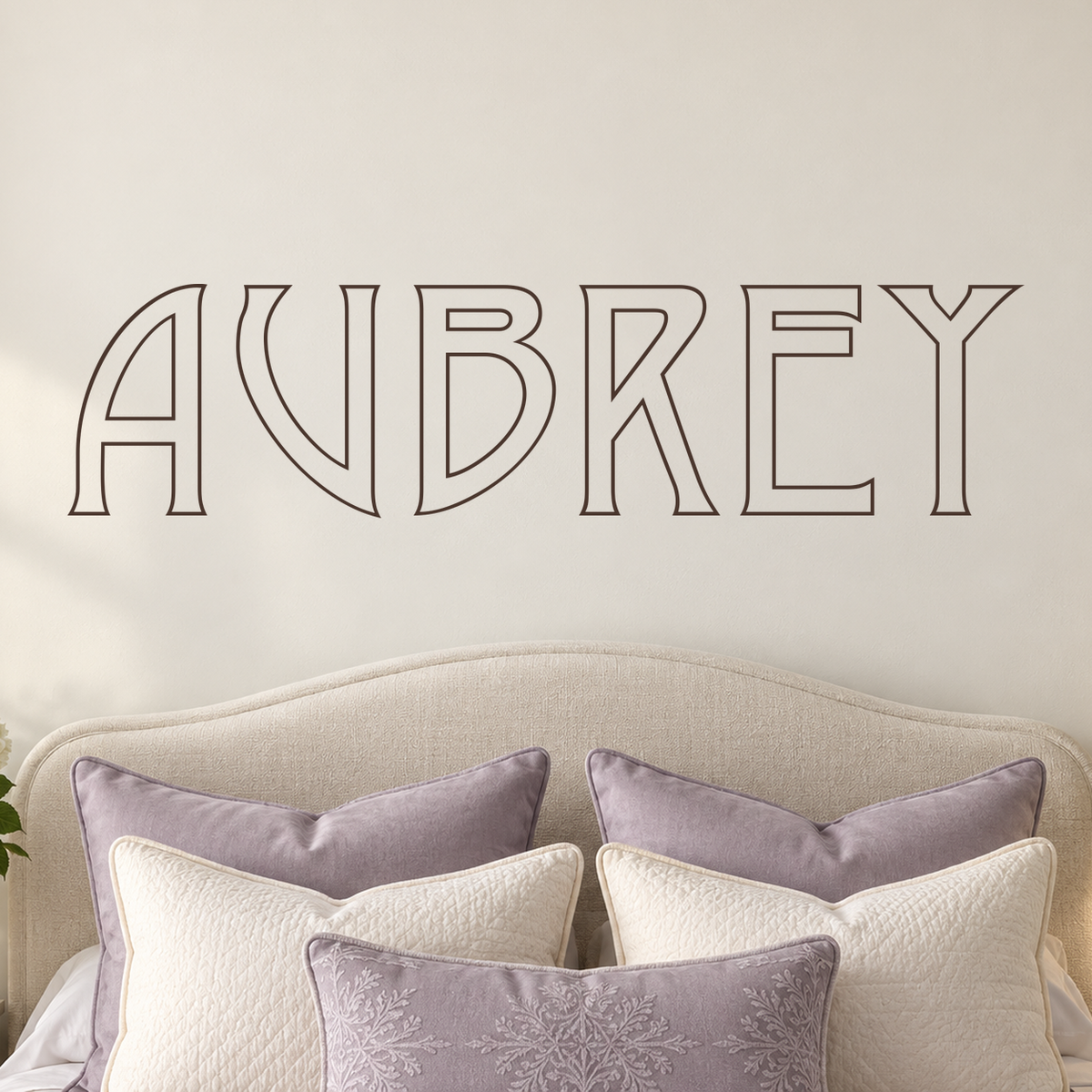 Close-up custom lettering example on a smooth wall