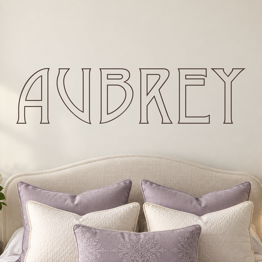 Close-up custom lettering example on a smooth wall