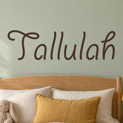 Close-up custom lettering example on a smooth wall