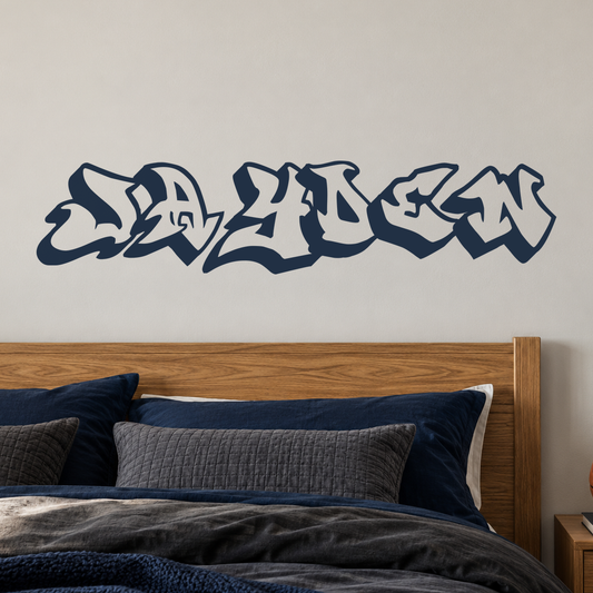 Close-up custom lettering example on a smooth wall