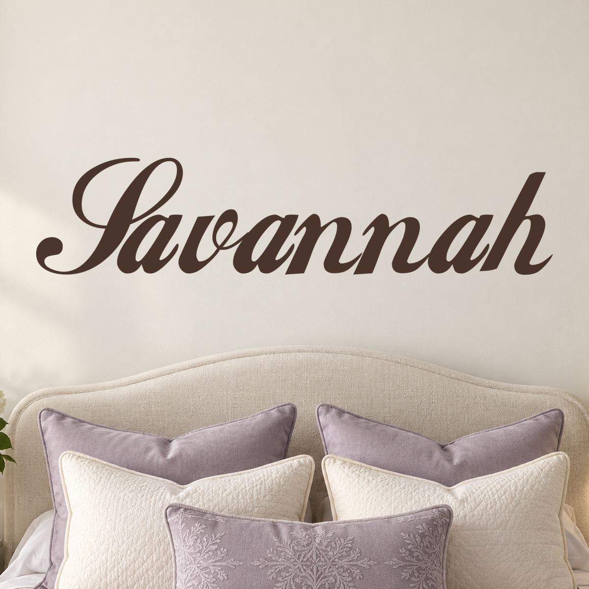 Close-up custom lettering example on a smooth wall