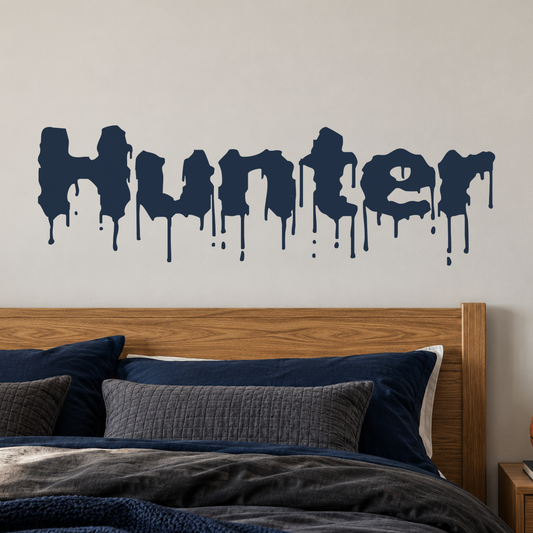 Close-up custom lettering example on a smooth wall