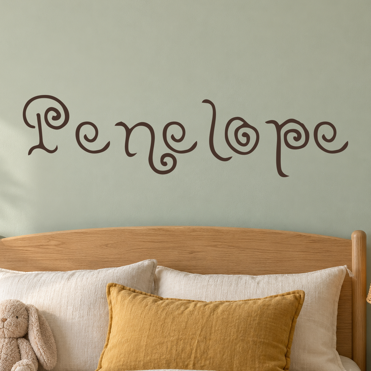 Close-up custom lettering example on a smooth wall