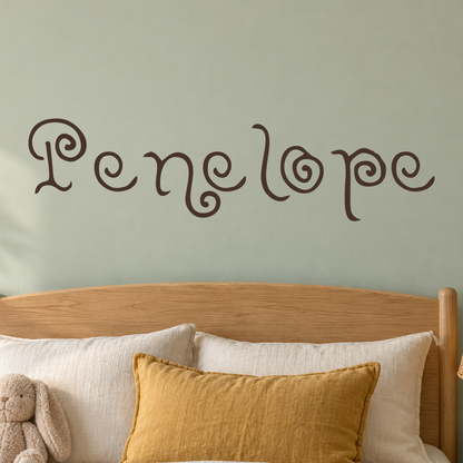 Close-up custom lettering example on a smooth wall